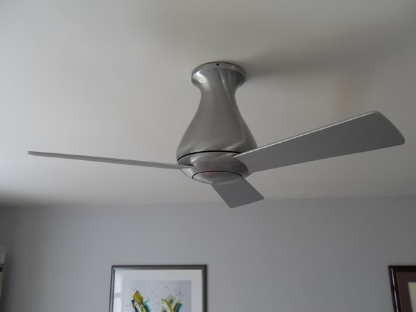 A contemperary three blade flush mount celing fan installed in Malvern, PA